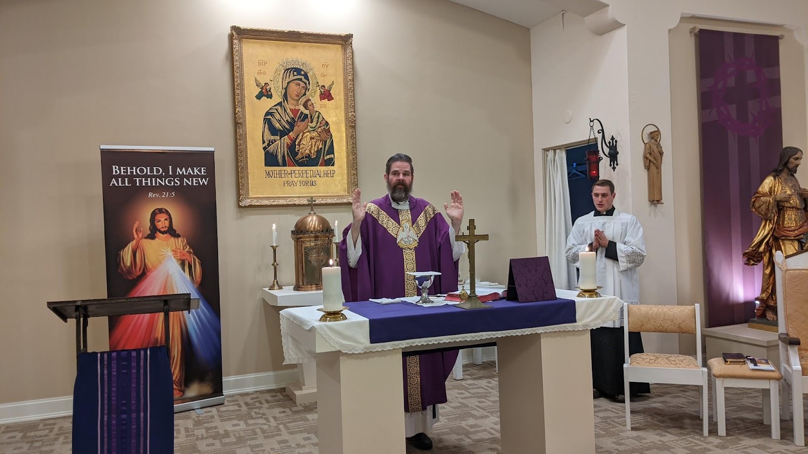 Father Chris Klusman Celebrating Mass in St. Thomas Moore High School Chapel